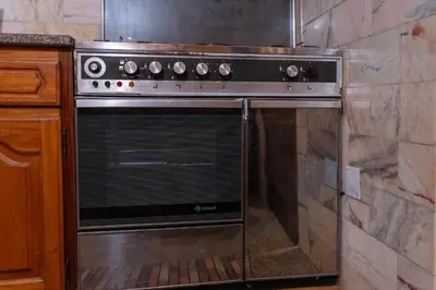 a stainless steel oven in a kitchen at Madeira Inn Paradise in Ribeira Brava
