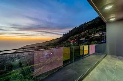 a house with a view of the ocean at C&C Sunset Villa in Arco da Calheta