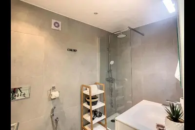 a bathroom with a shower and a sink at CloudyBay by Turin in Funchal