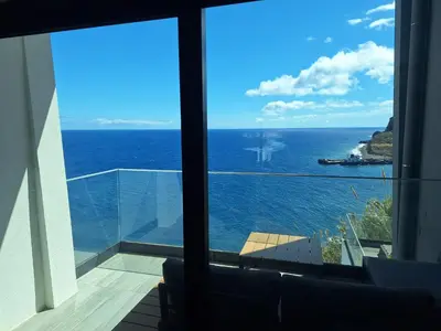 a view of the ocean from a house at Cliff Residence Ocean View in Gaula