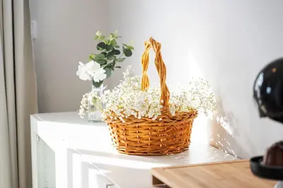 a basket of flowers sitting on top of a table at City Centre Retreat by Homie in Funchal
