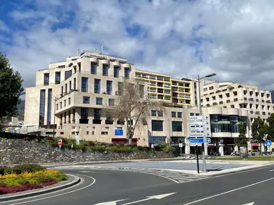 an empty street in front of a large building at Center Marina View Brown Studio in Funchal