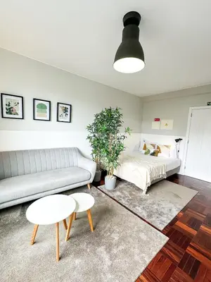 a living room with a couch and a bed at Santa Luzia's Pearl II D - Studio in Funchal