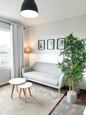 a living room with a couch and a table at Santa Luzia's Pearl II D - Studio in Funchal