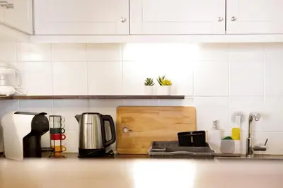 a kitchen counter top with a coffee maker and a coffee maker at Vista Formosa in Funchal