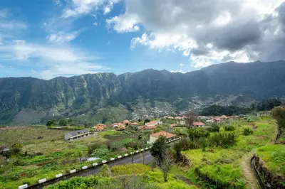 a town on a hill with mountains in the background at Refugio Da Xamusca in São Vicente