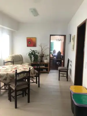 a dining room with a table and chairs in a room at Casa Dona Teresa in Santa Cruz