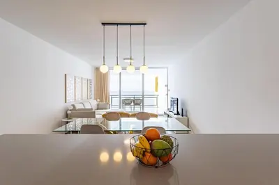 a bowl of fruit on a table in a living room at Sunset Cove in Funchal