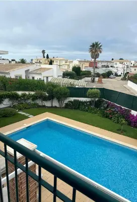 a view of a swimming pool on a balcony at Praia da Luz Mandeliu Exclusive 5 Star Private Villa Heated Pool in Luz