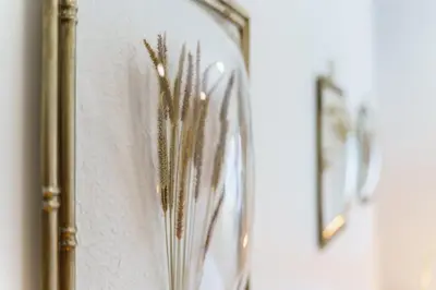 a mirror on a wall with a plant in it at GuestReady – Quaint Retreat in Funchal in Funchal
