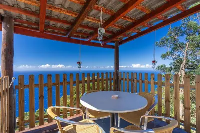 a bathroom with a toilet and a sink and a shower at Sunset Village by Holiday Rental Madeira in São Jorge