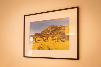 a picture of a picture frame hanging on a wall at Villa Rita in Machico in Machico