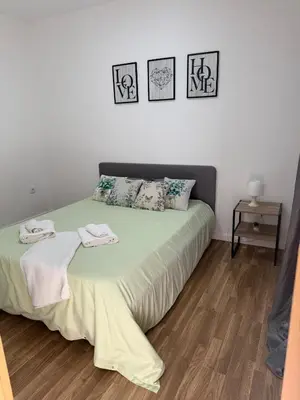 a bedroom with a bed with two towels on it at Sao Lourenco in Caniçal