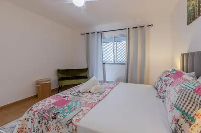 a bedroom with a bed and a window at flowers island house 8 infinity in Funchal