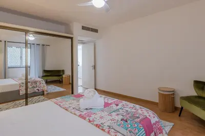 a hotel room with a bed and a mirror at flowers island house 8 infinity in Funchal