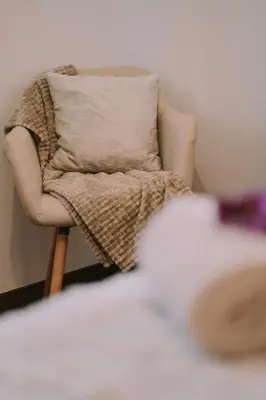 a chair with a pillow in a room at Bela Vista House in Ponta Delgada