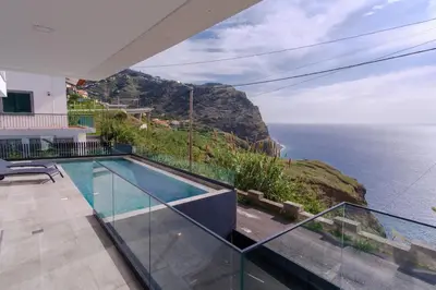 a villa with a view of the ocean at GuestReady - Madeiran oasis with ocean view in Campanário