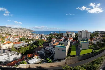 an aerial view of a city with buildings at Maravilhas I by An Island Apart in Funchal