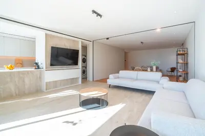 a living room with a couch and a table at Savoy Monumentalis your home in Madeira Island in Funchal
