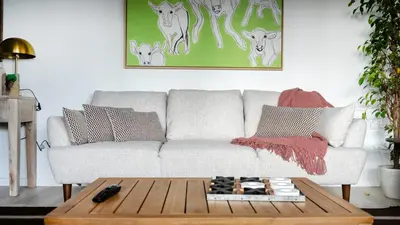 a living room with a couch and a coffee table at Amaro Oasis by LovelyStay in Funchal