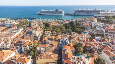 an aerial view of a city with cruise ships at Sao Pedro Central Flat by Atlantic Holiday in Funchal