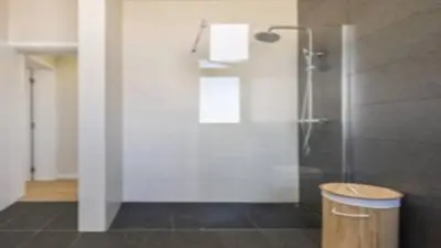 a bathroom with a shower with a glass door at Apartment superb in Funchal in Funchal