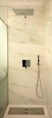 a shower in a bathroom with a glass door at Marco 4 Seasons- Spring in Arco da Calheta