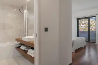 a bathroom with a sink and a shower at Madalenas II by An Island Apart in Funchal