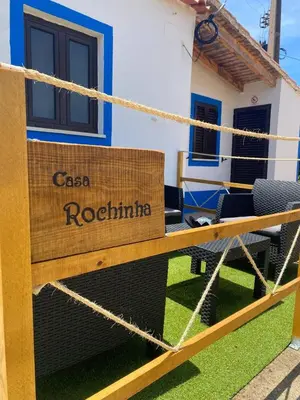 a sign that reads casa rocinha in front of a house at Casa Rochinha in Aljezur