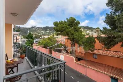 a balcony with a view of a city at Caniço Golden by An Island Apart in Caniço