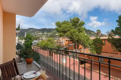 a balcony with a view of a city at Caniço Golden by An Island Apart in Caniço