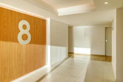 an empty hallway with the number eight on the wall at Funchal Acqua Blue 8E, a Home in Madeira in Funchal