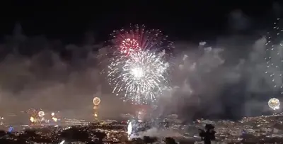 a firework display in a city at night at O CAMPO na CIDADE in Funchal