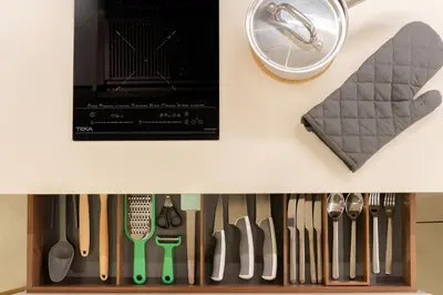 a drawer filled with lots of kitchen utensils at Safira Suites 201 in Funchal
