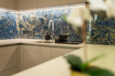 a kitchen with a sink and a faucet at Safira Suites 301 in Funchal