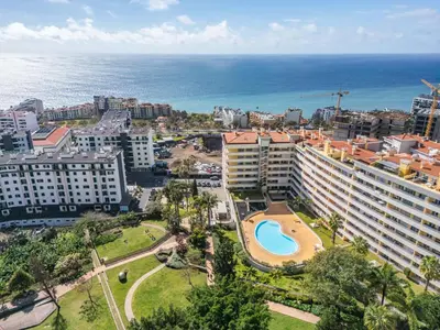 an aerial view of a city with the ocean at Lux Garden View by Homie in Funchal