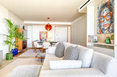 a living room with a couch and a table at Savoy Monumentalis, a Home in Madeira in Funchal