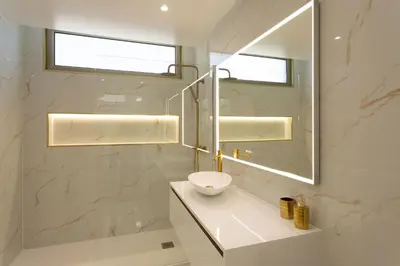 a bathroom with a sink and a mirror at Villa Andrade Ocean View in Funchal