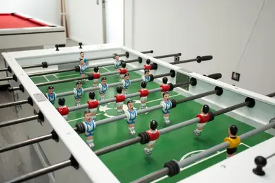 a group of people playing a game of snooker at Villa Andrade Ocean View in Funchal