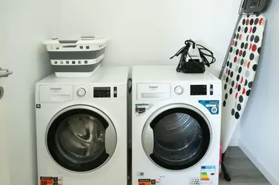 two washing machines sitting next to each other at Villa Andrade Ocean View in Funchal