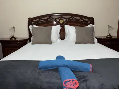 a person laying on top of a bed at 4 Saints apartement in Ribeira Brava