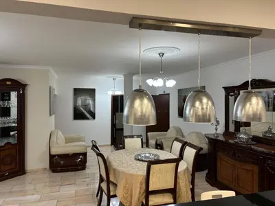 a dining room with a table and chairs at 4 Saints apartement in Ribeira Brava