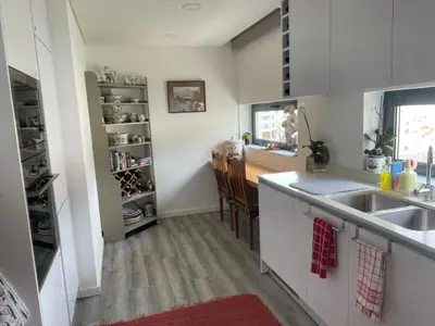 a kitchen with a sink and a counter top at Casa Dourada - Golden Beach Apt in Budens