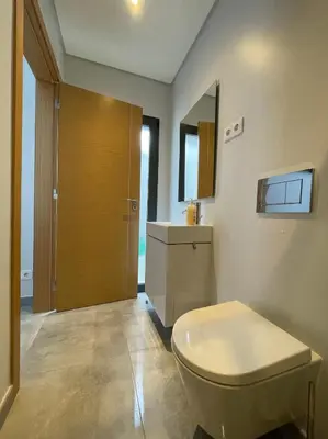 a bathroom with a toilet and a sink at SalemaView Ensuite bedroom in Salema