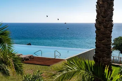 a swimming pool with a view of the ocean at Acqua Residence IV by An Island Apart in Funchal