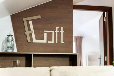 a sign on a wall in a living room at A lovely home in a quiet area in Quinta Grande