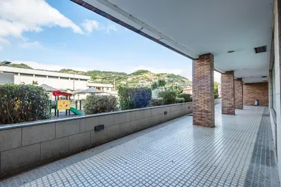 a balcony with a view of a playground at Casa Isaurinha by ALMA Holiday Rentals in Caniço
