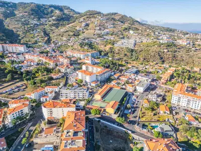 an aerial view of a city with a mountain at Casa Isaurinha by ALMA Holiday Rentals in Caniço