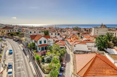 an aerial view of a city with buildings at Funchal Panoramic View, a Home in Madeira in Funchal