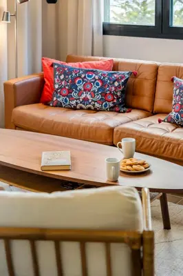 a living room with a couch and a coffee table at Villa Monte in Funchal